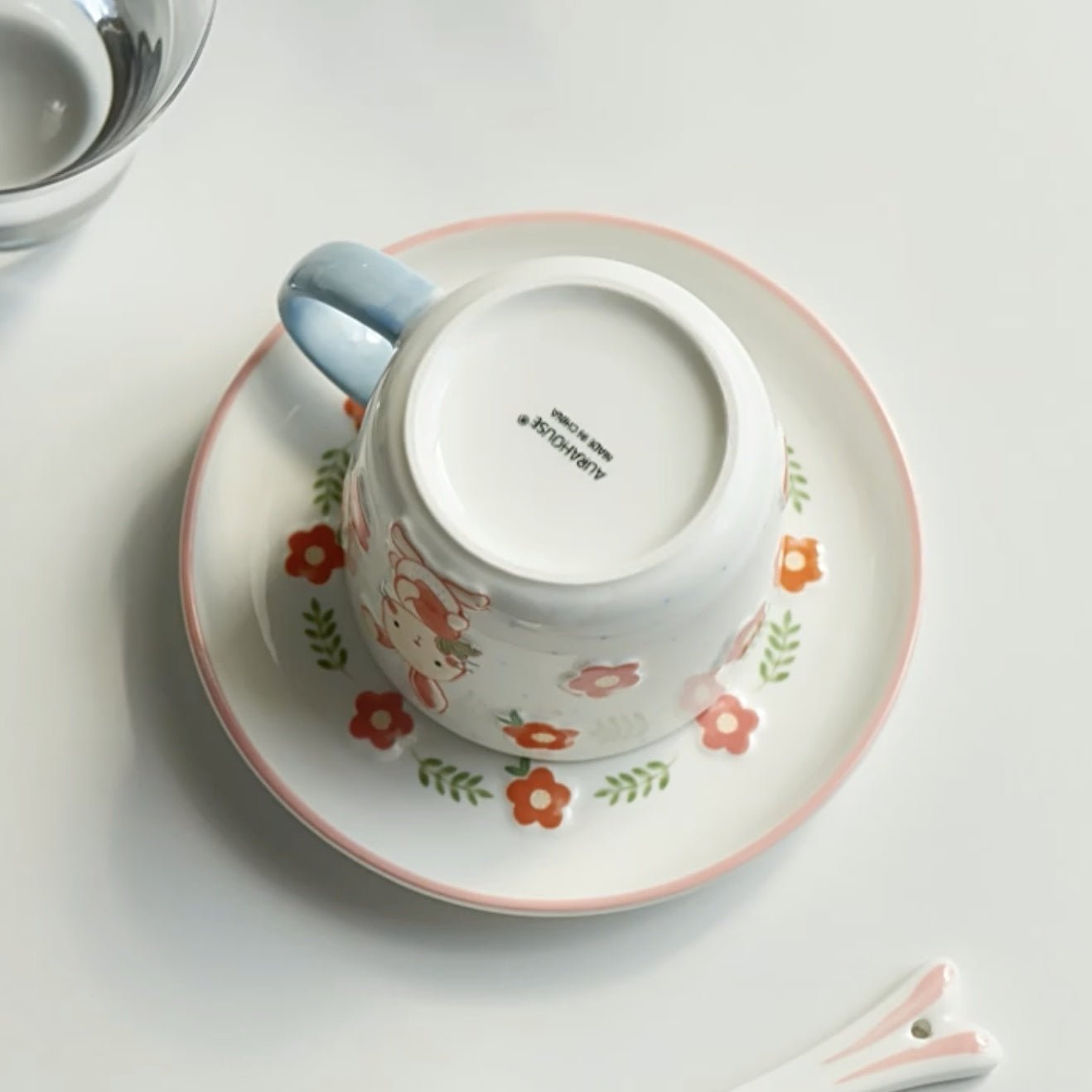 Embossed Glaze Bunny Cup & Saucer SetPorcelain / Ceramic