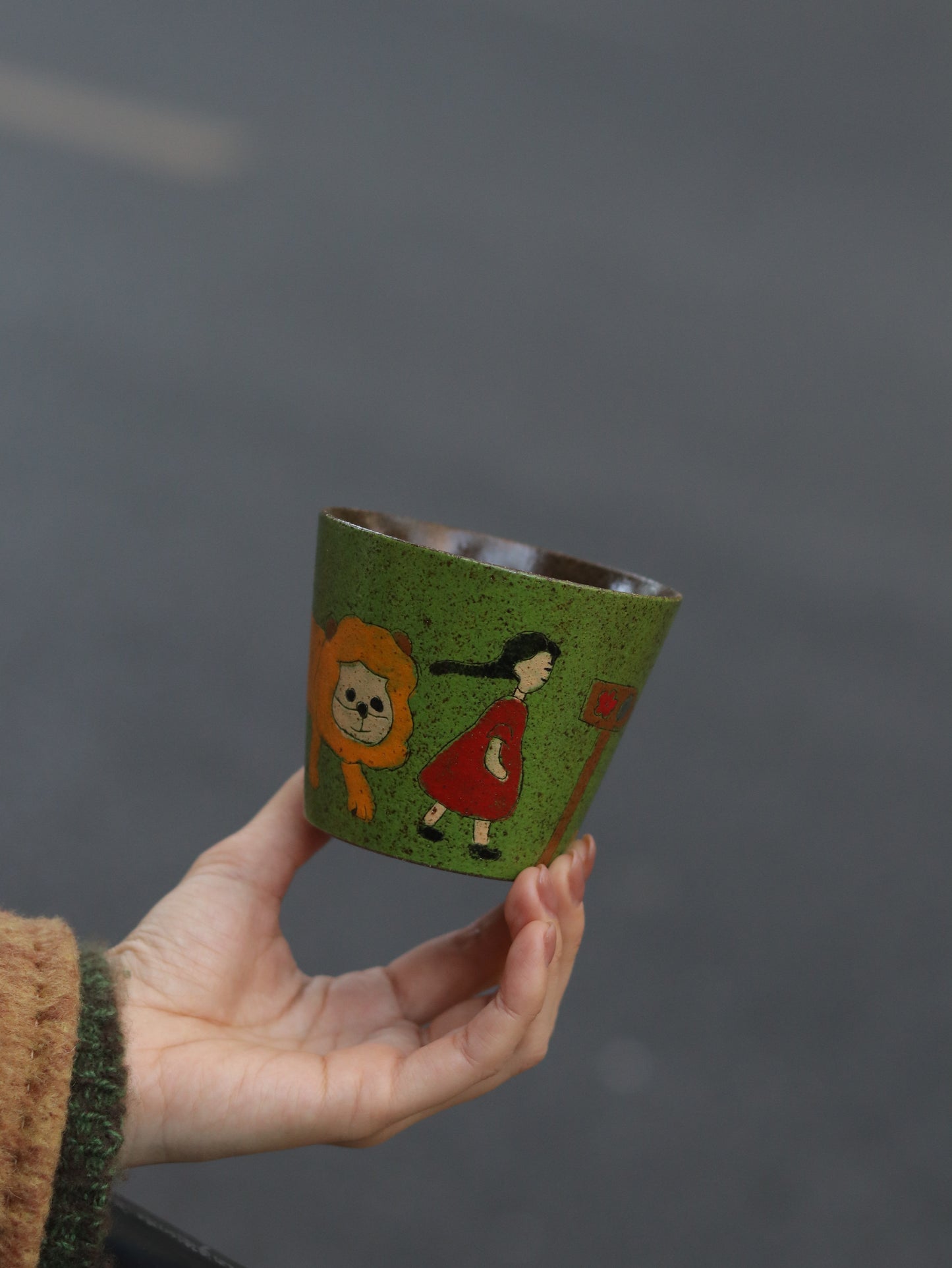 Side view of the 270ml hand-painted storybook ceramic cup