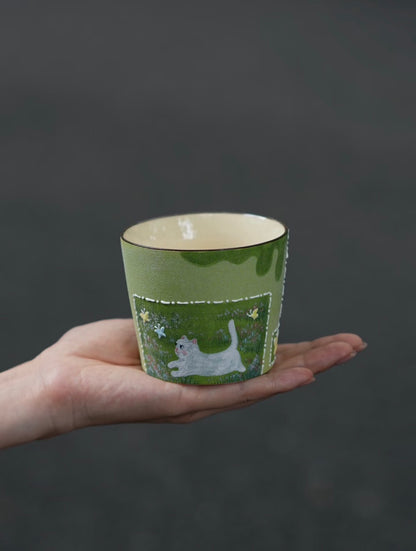 Butterfly Chase hand-painted cat ceramic cup with textured green finish